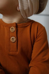 Rust evolutive onesie 