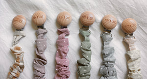 Sage polka dot pacifier clip