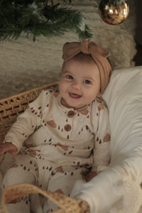 Pink beige evolving onesie with winter cabin pattern (imperfect)